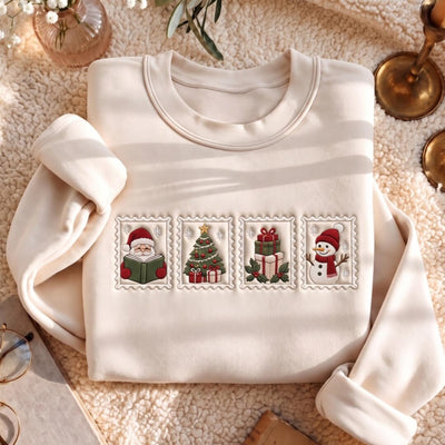 Christmas Stamp Santa Reading Book Snowman Tree Gifts Holiday embroidered sweatshirt — front view