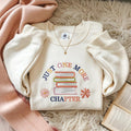 Just One More Chapter Stack of Books Daisy Flowers Colorful embroidered hoodie — front view