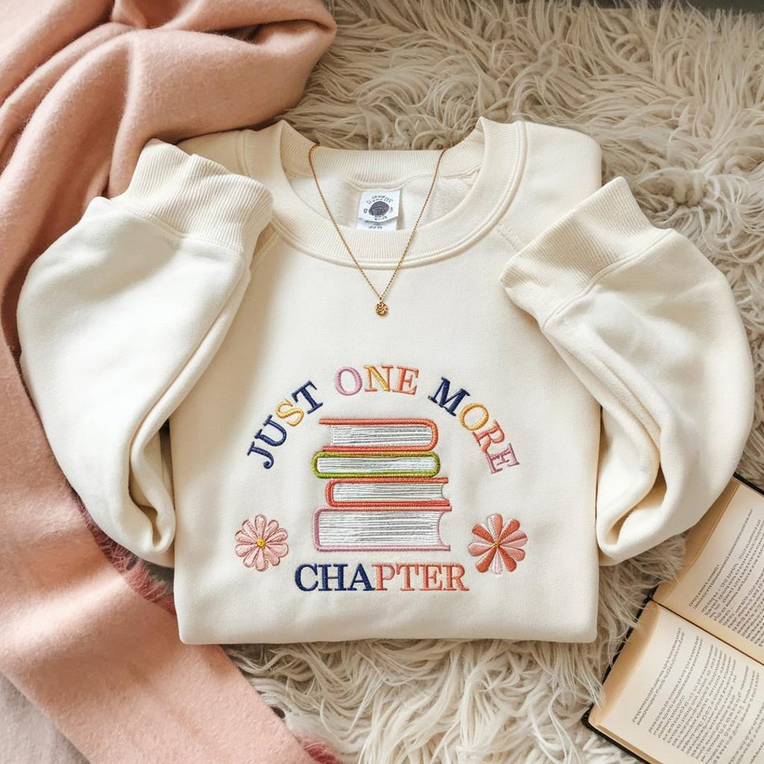 Just One More Chapter Stack of Books Daisy Flowers Colorful embroidered hoodie — front view
