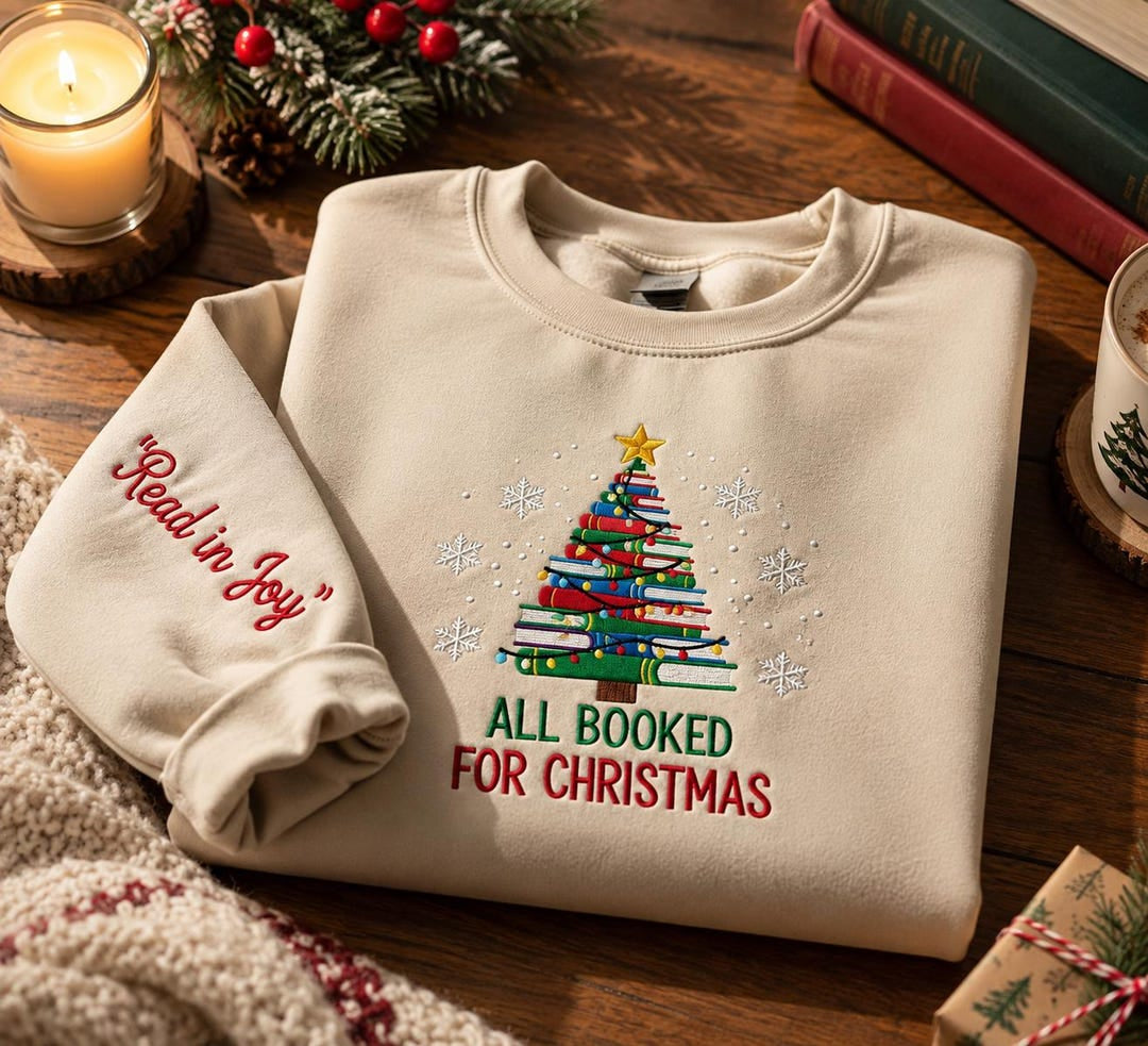 All Booked for Christmas Book Tree Snowflakes embroidered sweatshirt — front view