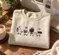 Four Gardening Geese Plant Book Lover Hobby embroidered sweatshirt — front view