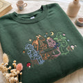 Fantasy Book Club Knight Dragon Princess Wizard Tea Party Mushroom embroidered sweatshirt — front view
