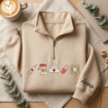 Personalized Nurse Syringe Coffee Cup Nurse Hat Pill Band-Aid Floral embroidered quarter-zip — front view