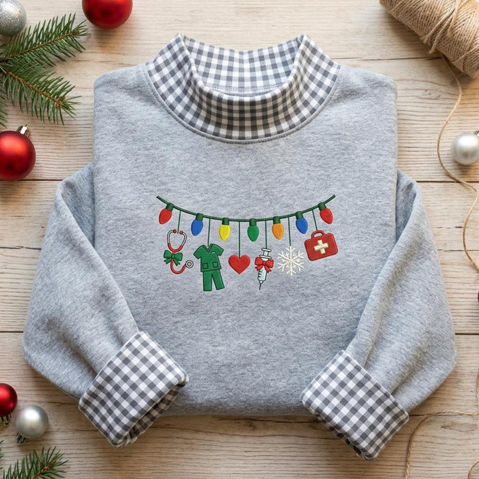 Christmas Nurse Stethoscope Scrubs Medical Holiday Lights Garland Embroidered Sweatshirt