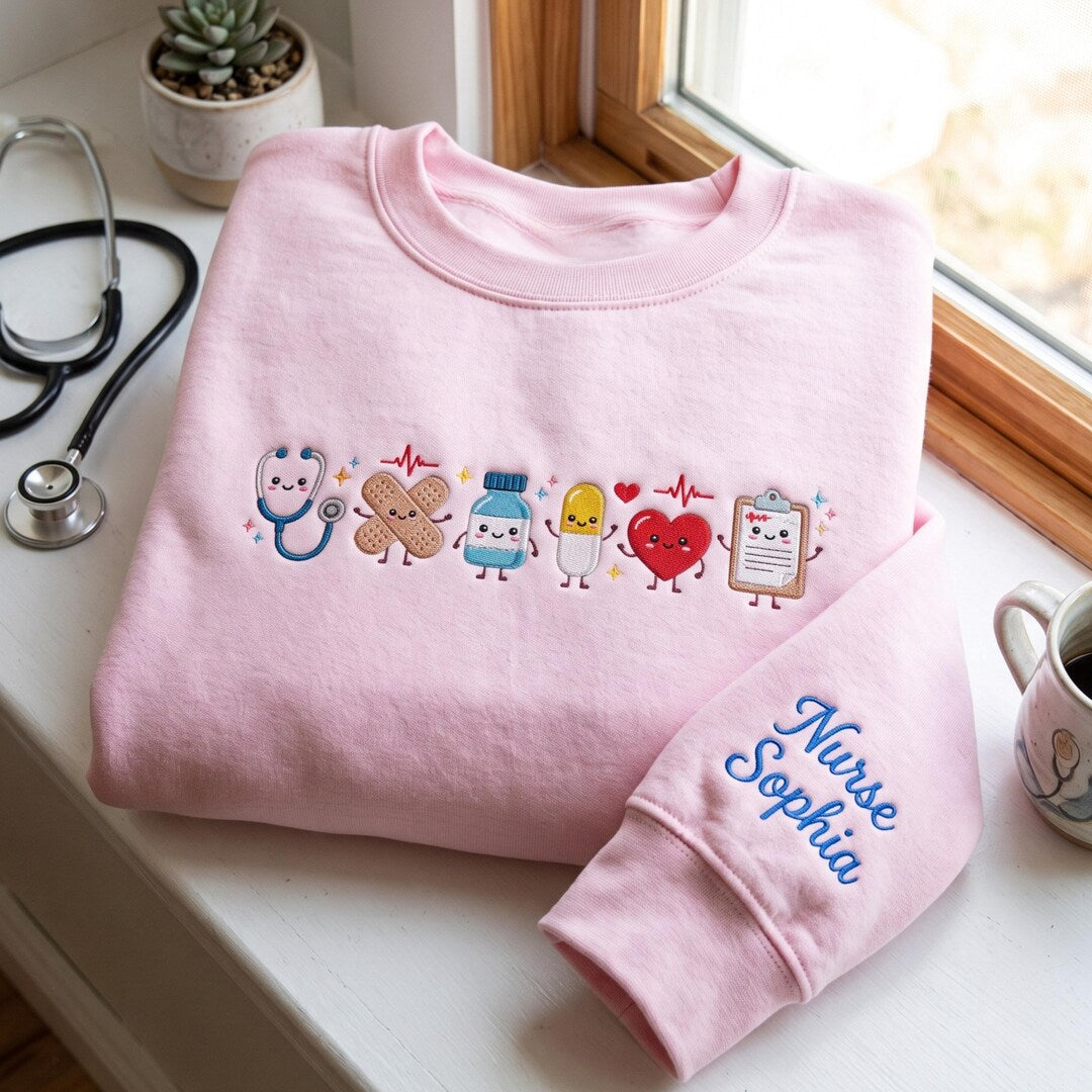 Personalized Nurse Cute Healthcare Stethoscope Bandage Pill Heart Clipboard embroidered sweatshirt — front view