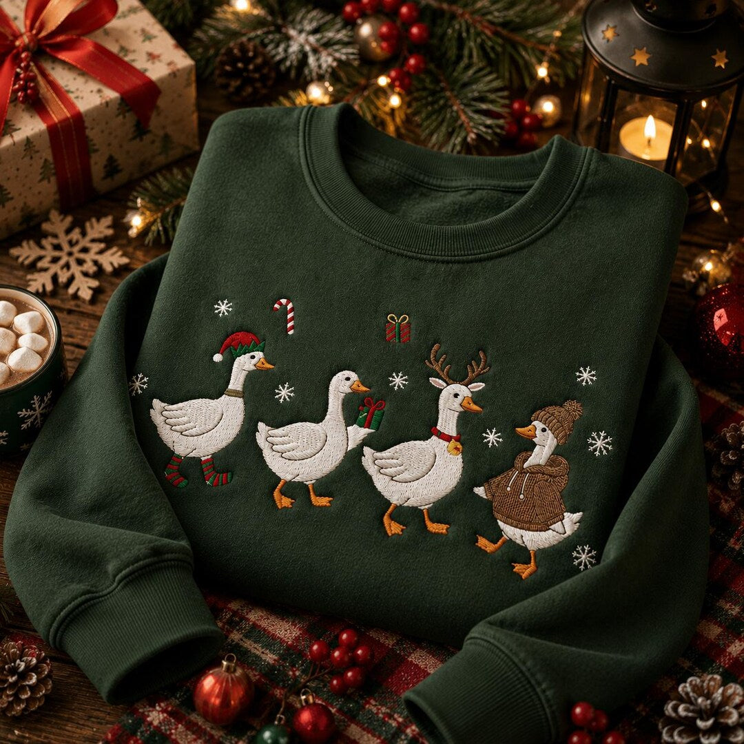 Christmas Geese Holiday Parade Santa Hat Reindeer Antlers Festive embroidered sweatshirt — front view