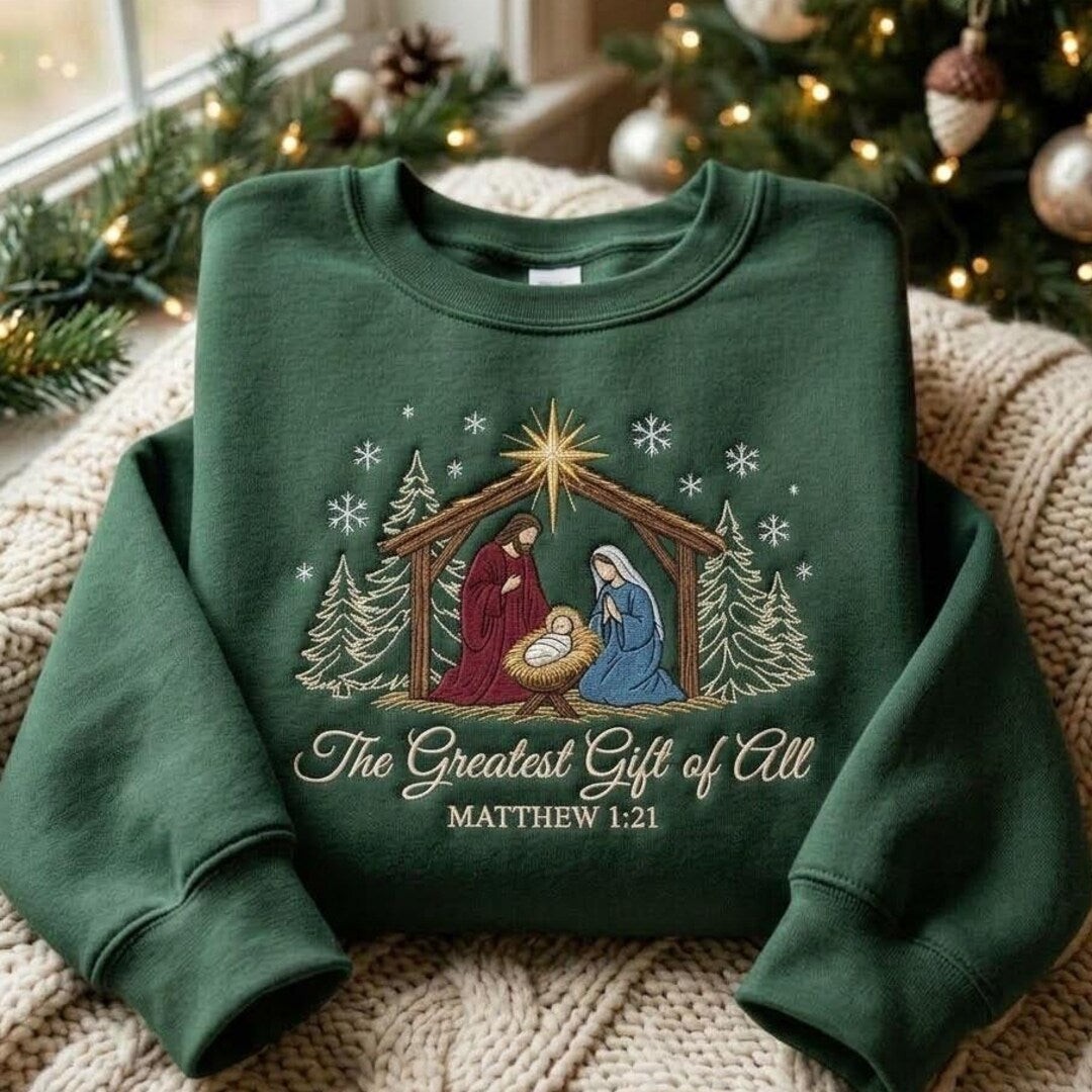 Christian Nativity Scene the Greatest Gift of All Matthew 1:21 Christmas embroidered sweatshirt — front view