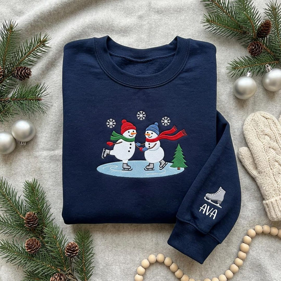 Personalized Ice Skating Snowman Couple Christmas Tree Snowflakes Sleeve Name embroidered sweatshirt — front view