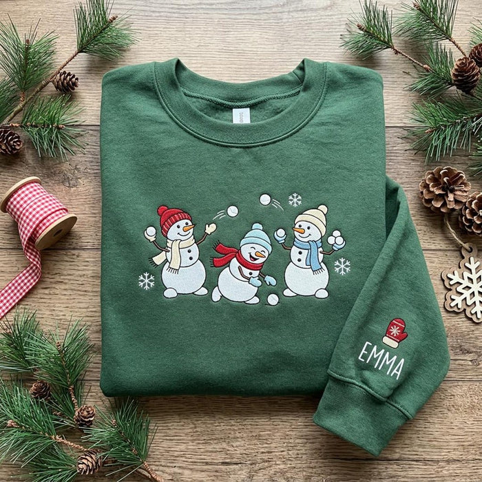 Personalized Three Snowmen Snowball Fight Christmas Sleeve Name Embroidered Sweatshirt
