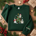 Personalized Snowmen Decorating Christmas Tree Sleeve Name embroidered sweatshirt — front view