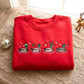 Christmas Mallard Ducks Santa Hat Reindeer Antlers Holiday Lights Festive embroidered sweatshirt — front view