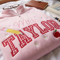 Personalized Mrs Teacher Gingham Pencil Apple Daisy embroidered sweatshirt — front view