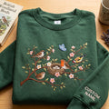 Personalized British Woodland Birds Nest Floral Branch Spring embroidered sweatshirt — front view