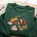 Personalized Cats Reading Books Tea Cup Compass Cozy Bookish embroidered sweatshirt — front view