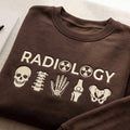 Radiology Skull Spine Hand Knee Pelvis Bones X-Ray Tech embroidered sweatshirt — front view