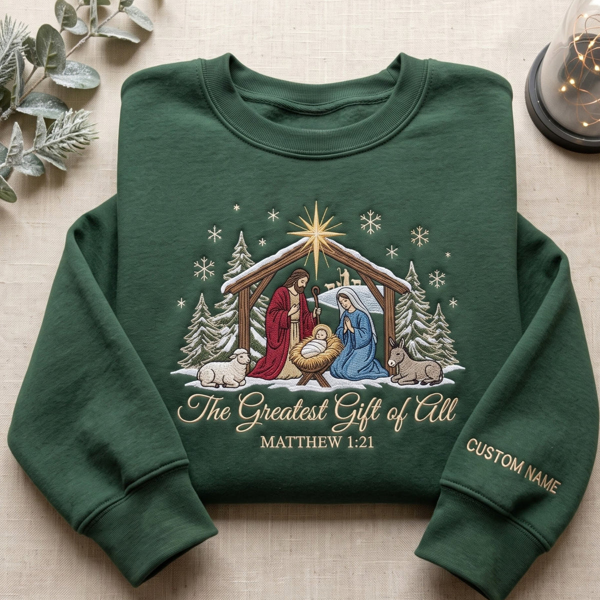 Personalized Nativity Scene the Greatest Gift of All Matthew 1:21 Christmas Faith embroidered sweatshirt — front view