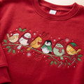 Christmas Birds on Branch Penguin Holly Festive embroidered sweatshirt — front view