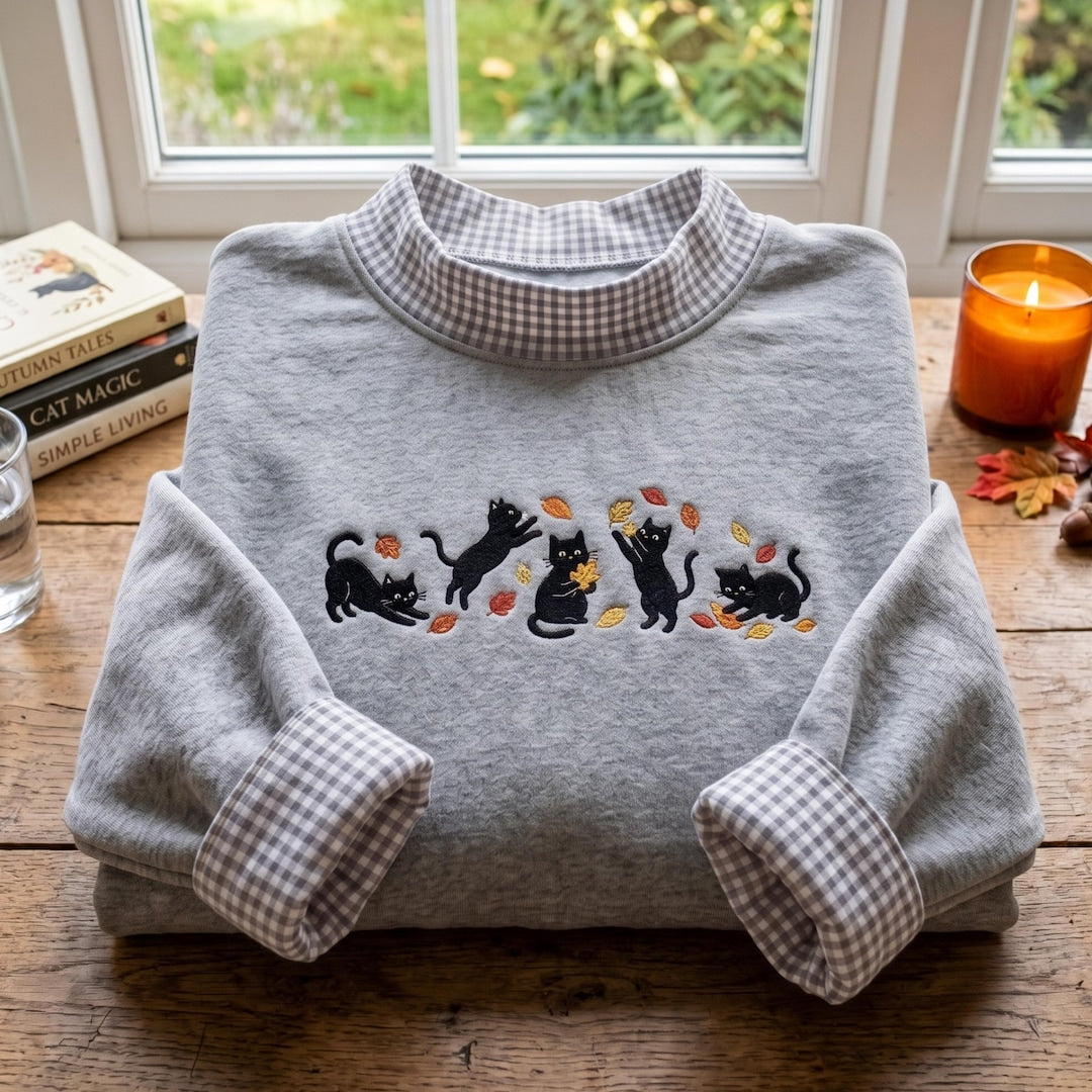 Black Cats Playing Fall Autumn Leaves Cozy embroidered sweatshirt — front view