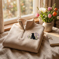 Black Lab Wildflowers Daisy Bluebell Botanical Dog embroidered sweatshirt — front view