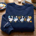 Personalized Hanukkah Geese Dreidel Menorah Latke Gelt embroidered sweatshirt — front view