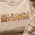 Personalized Fall Golden Retriever Puppies Basket Autumn Leaves Acorns Daisies embroidered sweatshirt — front view