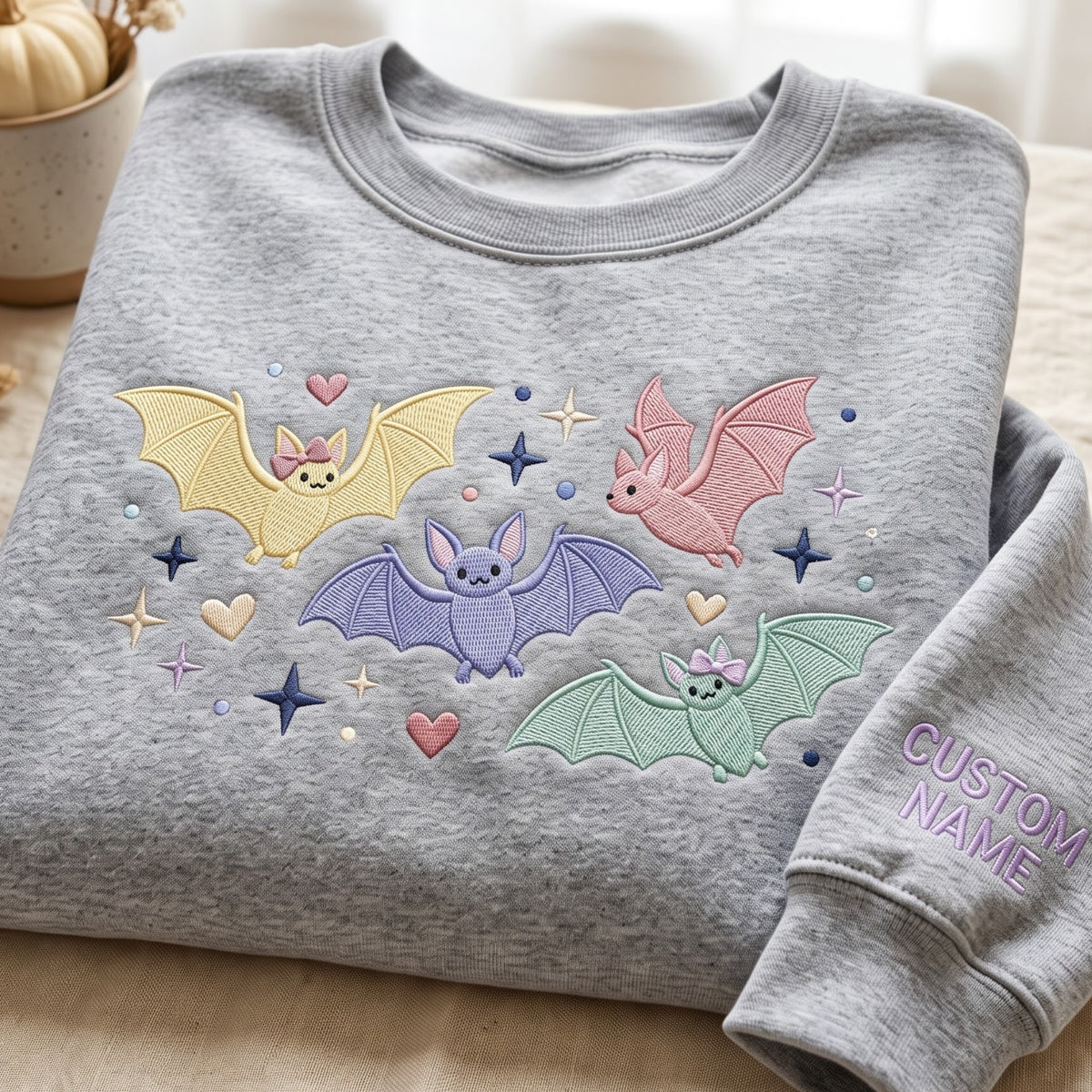 Personalized Cute Pastel Bats Stars Hearts Halloween Coquette Bow embroidered sweatshirt — front view