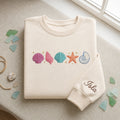 Personalized Colorful Seashells Starfish Nautilus Beach Ocean embroidered sweatshirt — front view