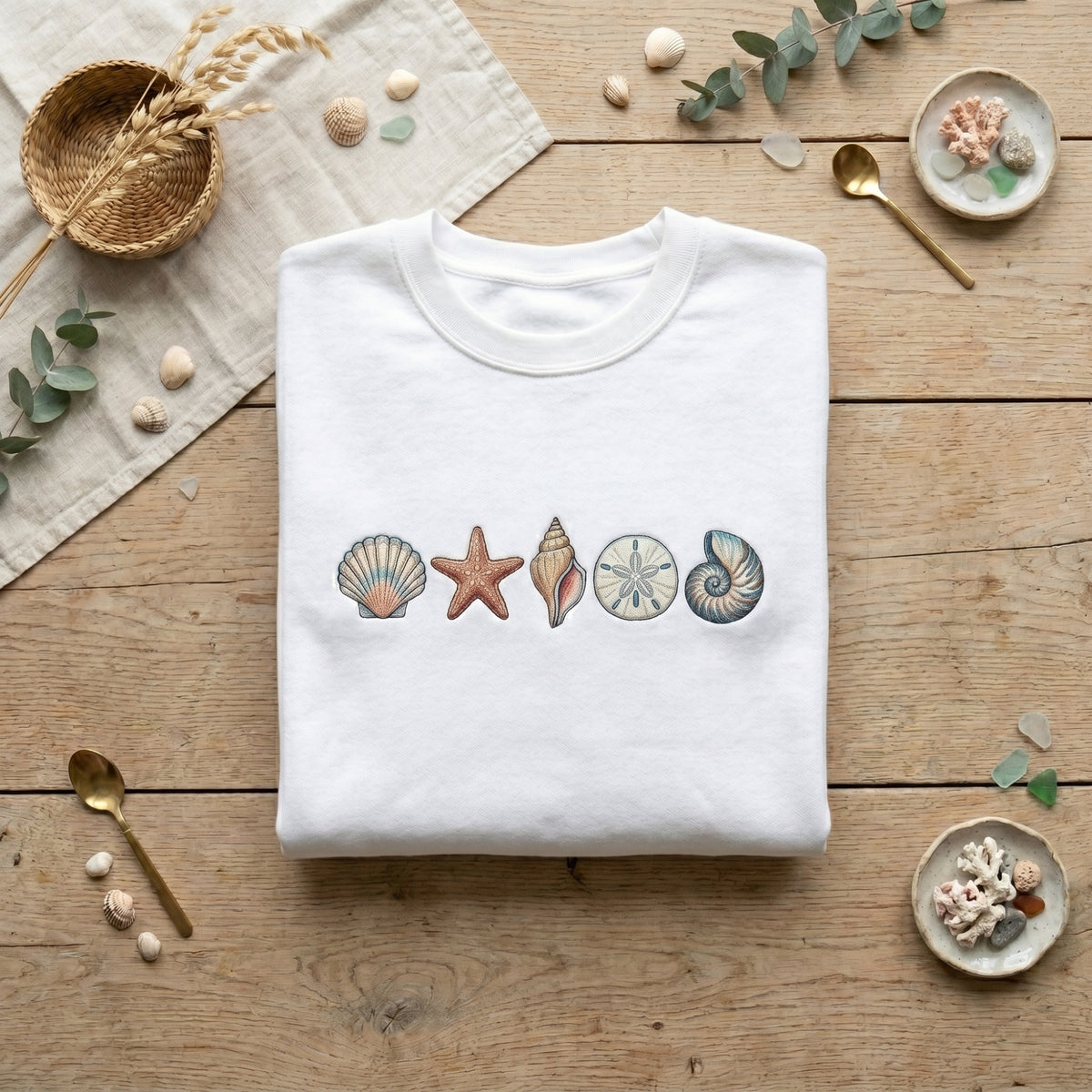 Sea Shells Starfish Sand Dollar Nautilus Coastal Beach embroidered sweatshirt — front view
