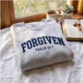 Forgiven Psalm 32:1 Faith Christian Collegiate Arch embroidered sweatshirt — front view