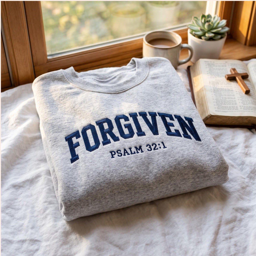 Forgiven Psalm 32:1 Faith Christian Collegiate Arch embroidered sweatshirt — front view