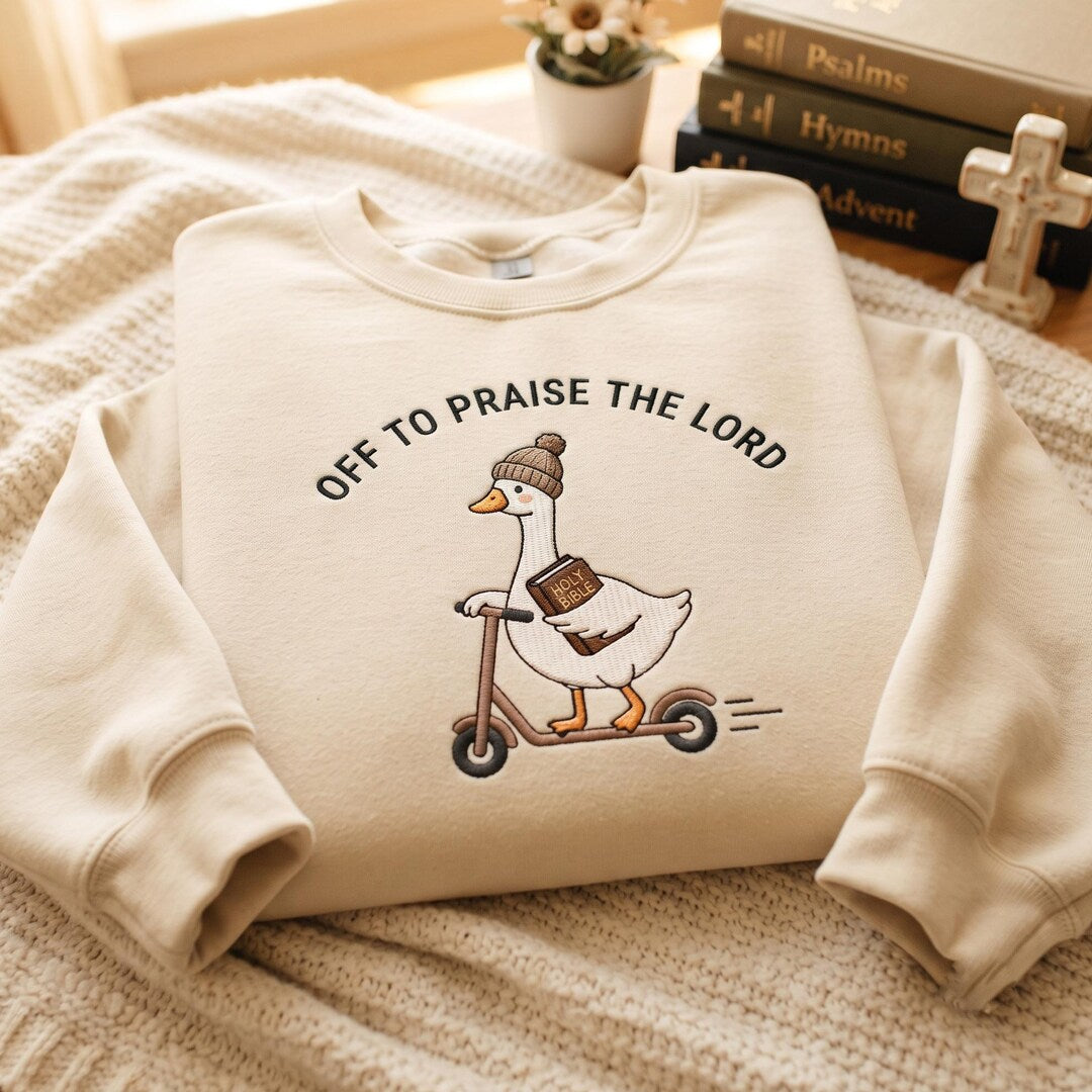 Funny Goose Riding Scooter Holy Bible Off to Praise the Lord Faith embroidered sweatshirt — front view