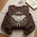 Personalized Luna Moth Moon Phases Wildflowers Botanical Celestial embroidered sweatshirt — front view