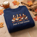 Just a Fall Goose Autumn Leaves Pumpkin Cozy Sweater Gang embroidered sweatshirt — front view