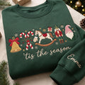 Personalized 'tis the Season Christmas Nutcracker Rocking Horse Gnome Bell Candy Cane embroidered sweatshirt — front view