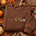 Thanksgiving Pug Turkey Pilgrim Pumpkin Pie Corn Fall Sleeve Accent embroidered sweatshirt — front view