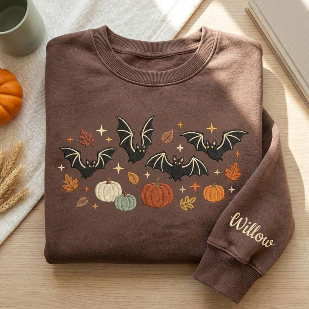 Personalized Halloween Bats Pumpkins Fall Leaves Sparkles Sleeve Name embroidered sweatshirt — front view