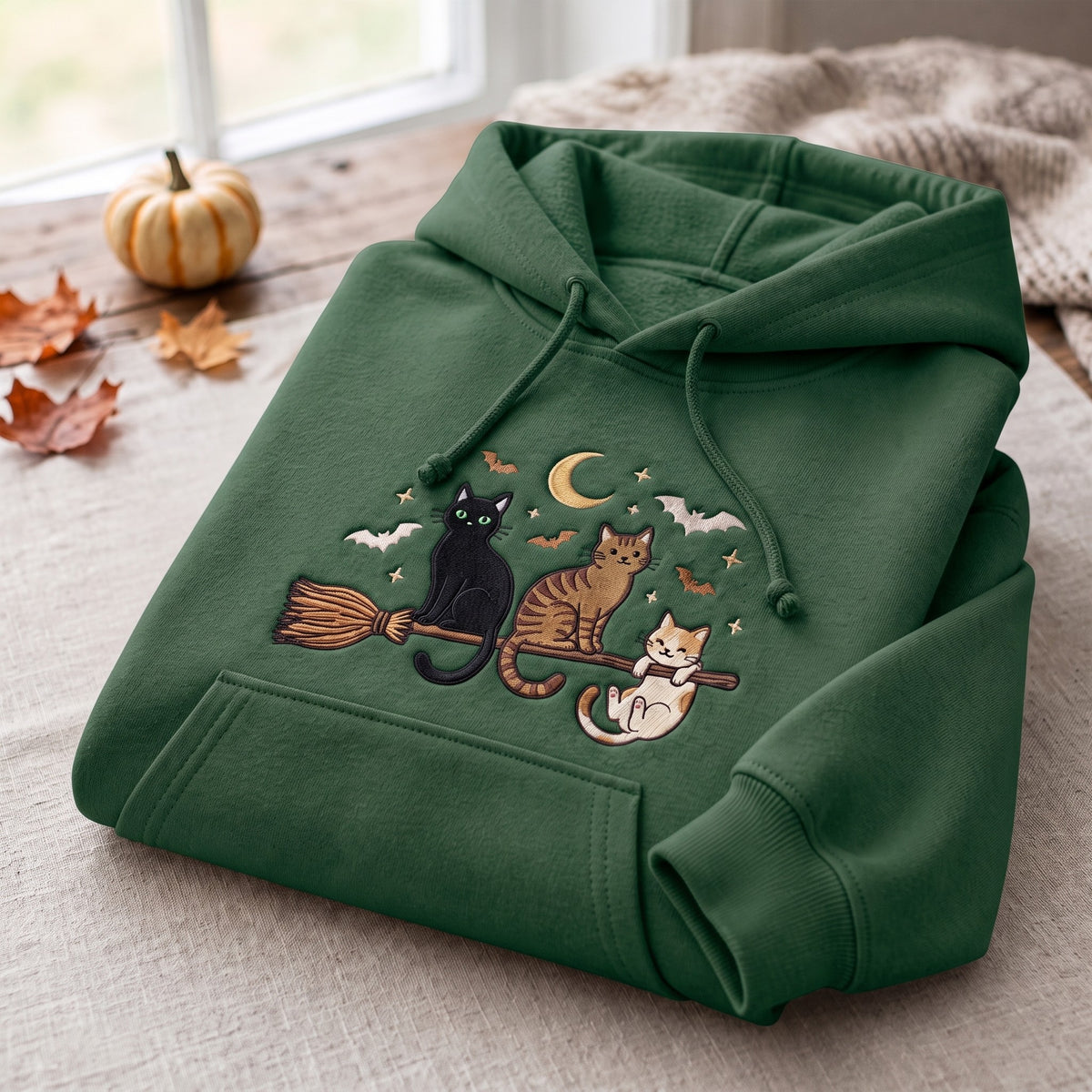 Three Cats Riding Witch Broom Crescent Moon Bats Halloween Embroidered Hoodie — Forest Green