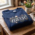 Personalized Nurse Wildflower Floral Script Custom Name embroidered sweatshirt — front view
