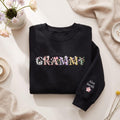 Personalized Grammy Floral Letter Grandkids Name Sleeve embroidered sweatshirt — front view