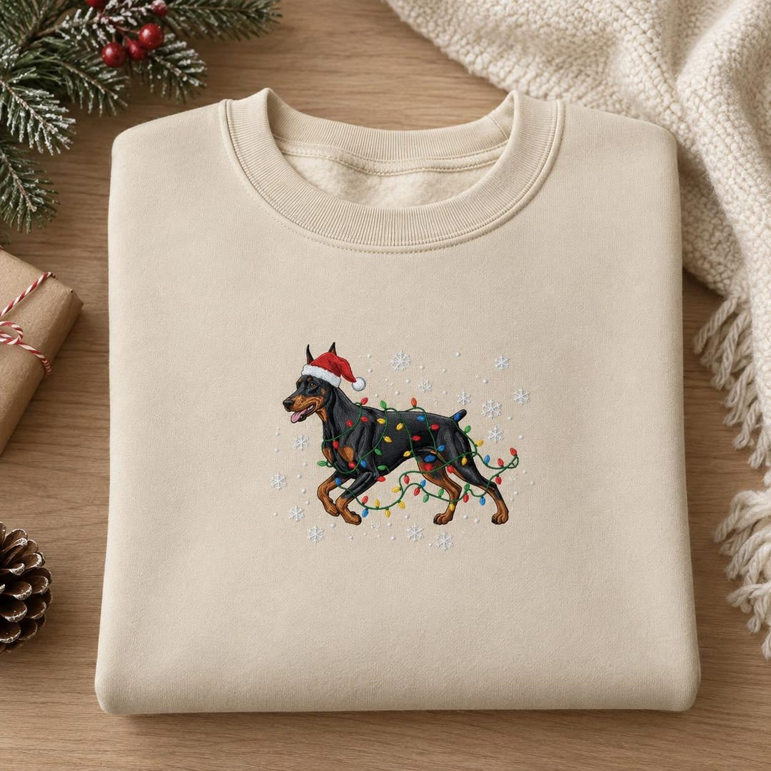 Christmas Doberman Santa Hat String Lights Snowflakes embroidered sweatshirt — front view