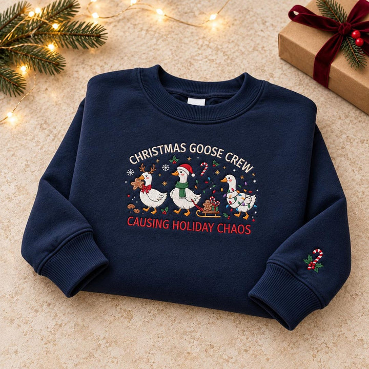 Christmas Goose Crew Causing Holiday Chaos Three Geese Santa Hat Candy Cane Sleigh embroidered sweatshirt — front view