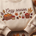 Personalized Cozy Season Pumpkin Crate Apple Basket Acorn Leaves Fall embroidered sweatshirt — front view