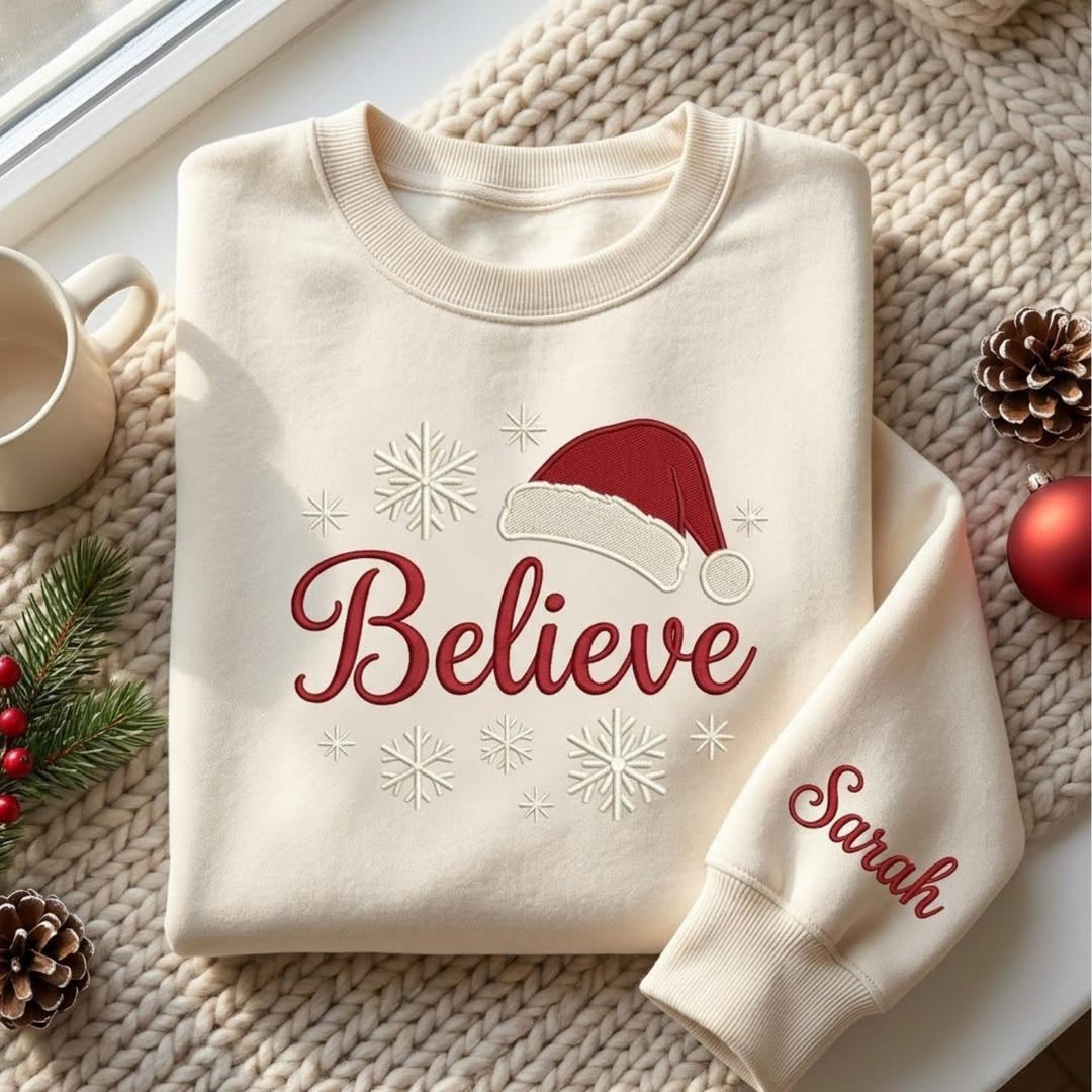 Personalized Believe Santa Hat Snowflakes Christmas Custom Name Sleeve embroidered sweatshirt — front view