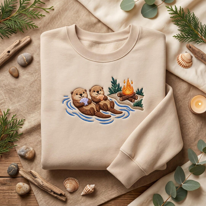 Personalized Two Otters Campfire Seashell Floating Couple embroidered sweatshirt — front view