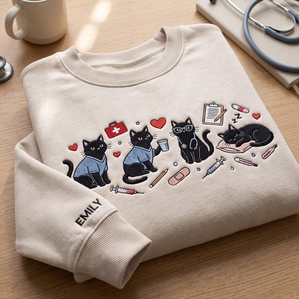 Personalized Black Cat Nurse Healthcare Worker Scrubs Stethoscope embroidered sweatshirt — front view