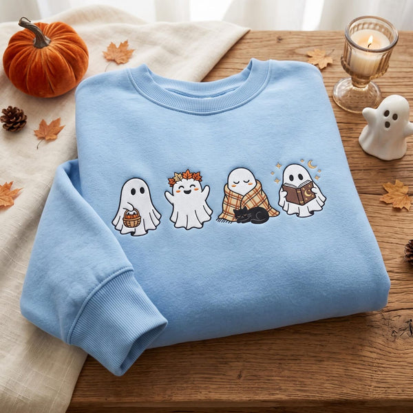 Halloween Four Cute Ghosts Autumn Leaves Pumpkin Basket Black Cat Cozy Blanket Book Reading embroidered sweatshirt — front view