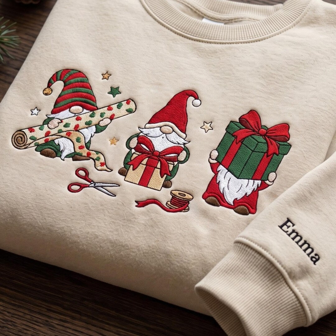 Personalized Christmas Gnomes Gift Wrapping Scissors Ribbon Name on Sleeve embroidered sweatshirt — front view