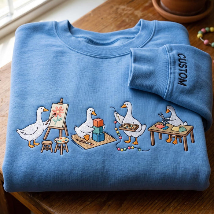 Personalized Goose Art Teacher Painting Blocks Beads Scissors Custom Name Embroidered Sweatshirt