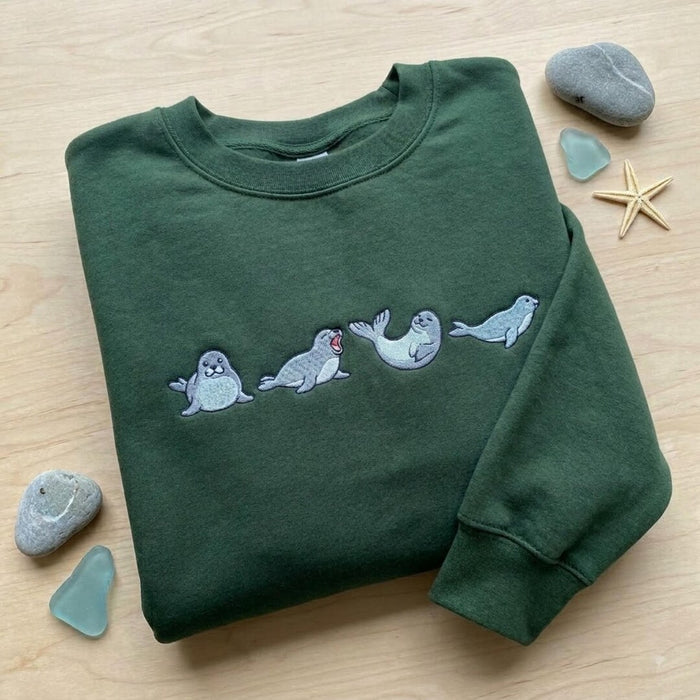 Playful Seals Four Poses Ocean Animal Embroidered Sweatshirt