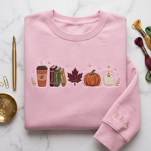 Personalized Fall Reading Books Pumpkin Candle Cozy Autumn embroidered sweatshirt — front view